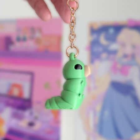 Ainlina Grubs Keychain (Happy or Sad) - Hollow Knight | Keychain Ainlina Grubs Keychain (Happy or Sad) - Hollow Knight | Keychain Keychain inspired by Hollow Knight's grubs ! You can choose the sad or the happy one. 3D printed with multiple colour. January 1st, 2026